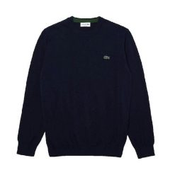 Klasyczny sweter Lacoste granatowy z okrągłym dekoltem. Niebieskie swetry męskie Lacoste, l, bez wzorów, z bawełny, bez kołnierzyka. Za 633.30 zł.