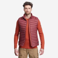 Kamizelka trekkingowa męska puchowa Forclaz MT100. Brązowe kamizelki męskie FORCLAZ, l, z materiału. Za 229.99 zł.