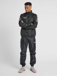 Kurtka ortalionowa sportowa dla dorosłych Hummel Core Spray Jacket. Czarne kurtki treningowe męskie HUMMEL, m, bez wzorów, z materiału, do piłki ręcznej. Za 130.00 zł.