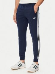 Adidas Spodnie dresowe 3-Stripes Sweatjoggers KE1688 Granatowy Regular Fit. Niebieskie spodnie dresowe męskie Adidas, bez wzorów, z dresówki. Za 259.99 zł.