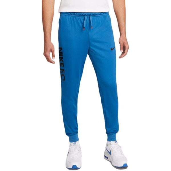 Spodnie Nike FC Dri-FIT, Mężczyźni. Niebieskie spodnie materiałowe męskie Nike, z poliesteru. Za 289.70 zł.
