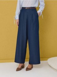 Spodnie wide leg z paskiem - granatowy. Niebieskie spodnie materiałowe damskie Sinsay, bez wzorów. Za 59.99 zł.