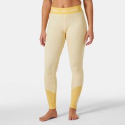 Damskie legginsy z merynosów Helly Hansen Lifa. Żółte legginsy damskie Helly Hansen, bez wzorów, z wełny. Za 372.00 zł.