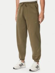 Adidas Spodnie dresowe Z.N.E. KF3816 Khaki Regular Fit. Brązowe spodnie dresowe męskie Adidas, bez wzorów, z bawełny. Za 399.99 zł.