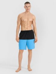 4F Spodenki plażowe męskie - niebieskie L. Niebieskie szorty męskie 4f, na lato, bez wzorów, z materiału, wakacyjne. W wyprzedaży za 59.99 zł.