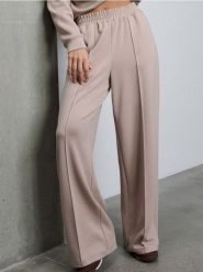 Spodnie wide leg z domieszką wiskozy - beżowy. Brązowe spodnie materiałowe damskie Sinsay, bez wzorów, z wiskozy. Za 49.99 zł.