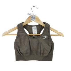 Second life - Gymshark stanik sportowy damski do jogi - Jak nowy. Brązowe biustonosze sportowe damskie Gymshark, bez wzorów, z materiału. Za 85.16 zł.