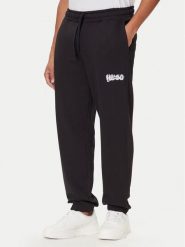 HUGO Spodnie dresowe Nyrotro 50549779 Czarny Loose Fit. Czarne spodnie dresowe męskie Hugo, bez wzorów, z bawełny. Za 489.99 zł.