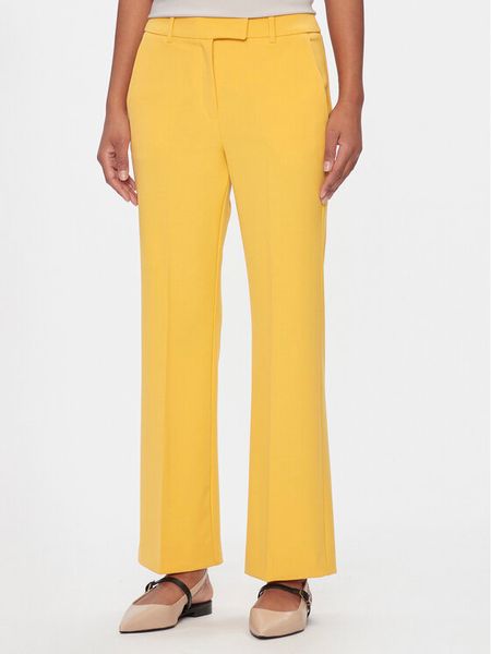 Marella Spodnie materiałowe Child 2413131061200 Żółty Regular Fit. Żółte spodnie materiałowe damskie Marella, bez wzorów, z materiału. Za 399.99 zł.