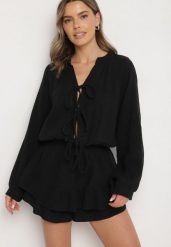 Czarny Wiązany Bawełniany Kombinezon Boho z Falbankami i Wiązaniem Lalelia. Czarne kombinezony damskie Born2be, na lato, uniwersalny, bez wzorów, z bawełny, boho, bez kołnierzyka, bez ramiączek. Za 159.99 zł.