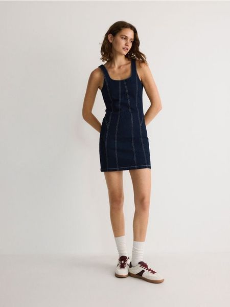 Sukienka mini - granatowy. Niebieskie sukienki damskie Reserved, na co dzień, l, bez wzorów, z bawełny, bez kołnierzyka, bez ramiączek, mini, dopasowane. W wyprzedaży za 29.99 zł.