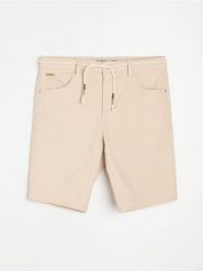 Bawełniane szorty jeansowe - zielony. Zielone szorty męskie Sinsay, z bawełny, bez kołnierzyka. Za 49.99 zł.