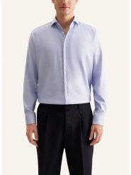 Seidensticker Koszula w kolorze błękitnym rozmiar: 41. Niebieskie koszule męskie Seidensticker, bez wzorów, z bawełny, bez kołnierzyka, bez ramiączek. Za 150.02 zł.