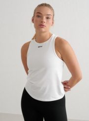 Damski top treningowy ultramiękki, szybkoschnący Soft Basic biały. Białe topy sportowe damskie Aim'n, m, bez wzorów, z dzianiny, bez ramiączek. Za 127.00 zł.