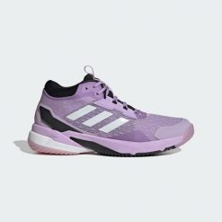Buty halowe Crazyflight 6 Mid. Białe buty sportowe na co dzień damskie Adidas, bez wzorów, z gumy, do siatkówki. Za 622.40 zł.