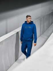 4F Bluza dresowa regular z kapturem męska 4F x Robert Lewandowski - granatowa XXL. Niebieskie bluzy z kapturem męskie 4f, m, z bawełny. Za 199.99 zł.