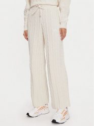 Adidas Spodnie dzianinowe JN7658 Écru Regular Fit. Spodnie materiałowe damskie Adidas, bez wzorów, z dzianiny. Za 289.99 zł.