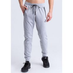 Spodnie dresowe Erima essential. Szare spodnie dresowe męskie Erima, bez wzorów, z dresówki, sportowe. Za 195.50 zł.