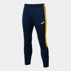 Spodnie do piłki nożnej męskie Joma Eco Championship długie. Niebieskie spodnie materiałowe męskie Joma, bez wzorów, sportowe. Za 183.00 zł.