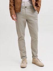 Jack & Jones Spodnie chino "Pstmarco" w kolorze beżowym rozmiar: W28/L32. Brązowe spodnie materiałowe męskie Jack & Jones, z aplikacjami, ze skóry. Za 130.99 zł.