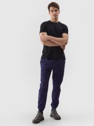 4F Spodnie casual joggery męskie - granatowe L. Niebieskie spodnie dresowe męskie 4f, bez wzorów, z bawełny. W wyprzedaży za 119.99 zł.
