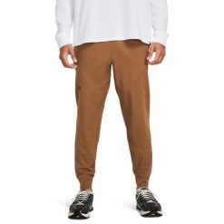 Spodnie dresowe męskie Under Armour UNSTOPPABLE JOGGERS. Brązowe spodnie dresowe męskie Under Armour, z dresówki. Za 279.99 zł.