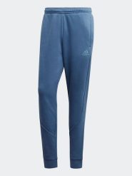 Adidas Spodnie dresowe "RECBOS" w kolorze niebieskim rozmiar: XS. Niebieskie spodnie dresowe męskie Adidas, bez wzorów, z dresówki. Za 95.45 zł.