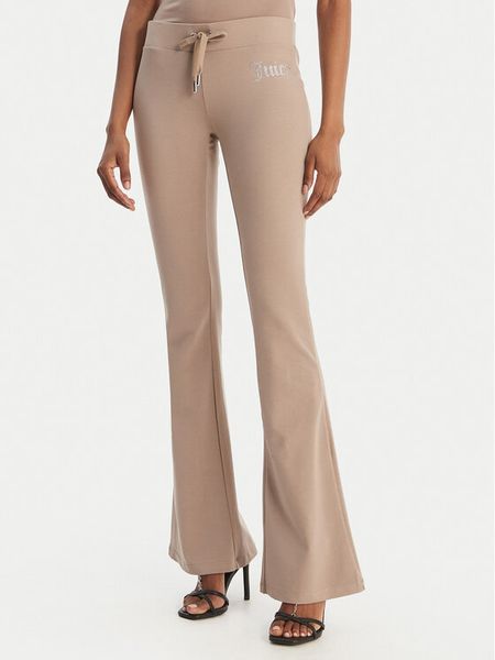 Juicy Couture Spodnie dresowe Christine JCWBJ126309 Beżowy Flared Leg. Brązowe spodnie dresowe damskie Juicy Couture, m, bez wzorów, z bawełny. Za 349.99 zł.