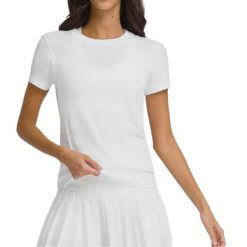 T-shirt Wilson Women's Seamless Pro. Białe t-shirty damskie Wilson, s, bez wzorów, bez kołnierzyka. W wyprzedaży za 282.40 zł.