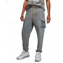 Spodnie sportowe męskie Nike Air Jordan. Szare spodnie sportowe męskie Nike, z bawełny. Za 316.00 zł.
