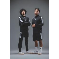 Spodnie treningowe Erima Intro Junior czarne. Czarne spodnie sportowe damskie 55PROTEC, z materiału, na fitness i siłownię. Za 221.99 zł.