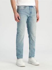 Jeansy slim - niebieski. Niebieskie jeansy męskie Sinsay. Za 49.99 zł.