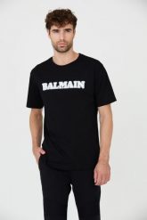 BALMAIN Czarny t-shirt z białym logo Retro Balmain Flock. Czarne t-shirty męskie Balmain, m, bez wzorów, bez kołnierzyka. W wyprzedaży za 1,299.99 zł.