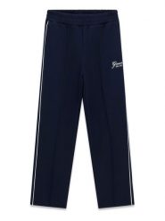 Guess Spodnie dresowe J6YB12 K3932 Granatowy Regular Fit. Niebieskie spodnie dziewczęce Guess, z dresówki. Za 214.99 zł.