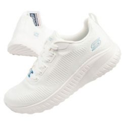 Buty Skechers 117209/OFWT białe. Białe buty sportowe na co dzień damskie bez wzorów, z materiału. Za 432.01 zł.