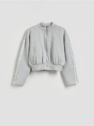 Bluza z koronkowym zdobieniem - jasnoszary. Szare bluzy bez kaptura damskie Reserved, l, z bawełny. Za 99.99 zł.