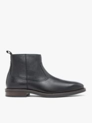 Czarne botki ze skóry licowej. Czarne buty zimowe męskie Ryłko, ze skóry, przed kolano, bez zapięcia. Za 599.99 zł.