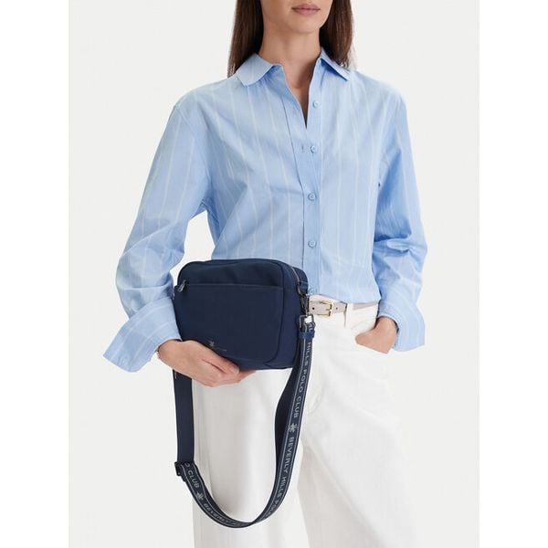 Torebka Beverly Hills Polo Club. Niebieskie listonoszki damskie Beverly Hills Polo Club, bez wzorów, bez dodatków. Za 129.99 zł.