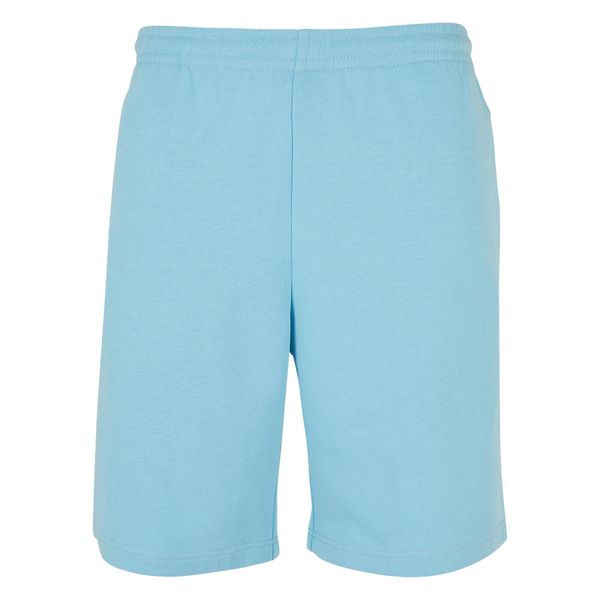 Szerokie spodenki dresowe z frotte Urban Classics. Niebieskie szorty męskie Urban Classics, z dresówki, bez kołnierzyka. Za 170.50 zł.