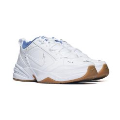 Buty sportowe Nike AIR MONARCH IV 415445-105. Białe buty sportowe na co dzień męskie Nike, z dresówki, bez zapięcia, na fitness i siłownię. Za 349.00 zł.