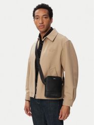 Tommy Hilfiger Saszetka Th Central Mini Reporter AM0AM14433 Czarny. Czarne saszetki męskie Tommy Hilfiger, ze skóry. Za 369.99 zł.