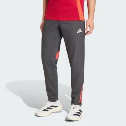 Spodnie Liverpool FC Tiro 25 Competition Presentation. Czarne spodnie materiałowe męskie Adidas, bez wzorów, z dresówki, sportowe. Za 279.00 zł.