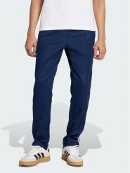 Adidas Spodnie dresowe CLASSIC Błękitny Slim Fit. Niebieskie spodnie dresowe męskie Adidas, bez wzorów, z dresówki. Za 278.99 zł.