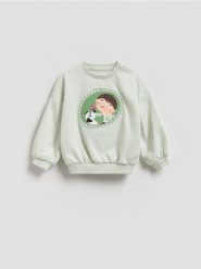 Bluza z nadrukiem Pucio - jasnozielony. Zielone bluzy i bluzki niemowlęce Reserved, bez wzorów, z bawełny, bez ramiączek, bez kaptura. Za 55.99 zł.