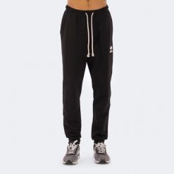 Spodnie Errea Denali. Czarne spodnie materiałowe męskie ERREA, bez wzorów, z bawełny, sportowe. Za 266.30 zł.