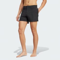 Szorty adidas Iconisea Swim Short Length. Czarne szorty męskie Adidas, bez wzorów, z materiału. Za 229.00 zł.