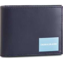 Duży Portfel Męski CALVIN KLEIN JEANS - Coated Canvas Billfold W Coin K40K400836 449. Niebieskie portfele męskie Calvin Klein Jeans, bez wzorów, z jeansu. W wyprzedaży za 219.00 zł.