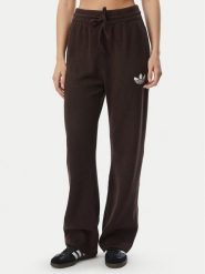 Adidas Spodnie dresowe Essentials IA4437 Brązowy Loose Fit. Brązowe spodnie dresowe damskie Adidas, l, bez wzorów, z dresówki. Za 298.99 zł.