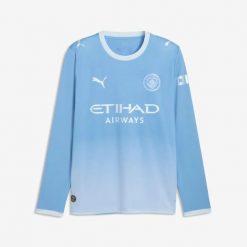 Koszulka piłkarska Manchester City 26/27 domowa. Niebieskie bluzki sportowe damskie Puma, m, z materiału, bez kołnierzyka, bez ramiączek. Za 489.99 zł.