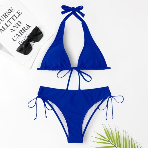 Bikini wiązane na szyję do plażowania Trien. Czarne bikini damskie Intica, bez wzorów. W wyprzedaży za 129.00 zł.